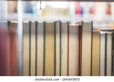 Close up picture of a variety of books in the public library. 