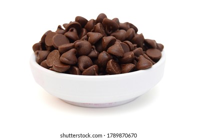 Close up pile of chocolate morsels on white background - Powered by Shutterstock