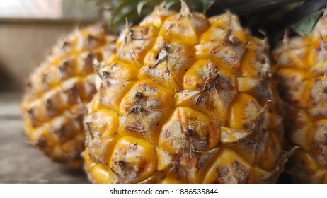 Close Up Pineapples in the background