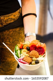 Close Up Of Pita With Falafel In Restaurant At Lunch Time