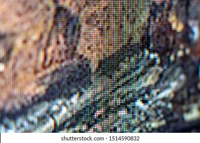 a close up pixels on the computer screen or monitor device surface. digital gadgets