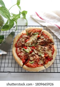 Close Up Of Pizza, It Is A Food From Italy Which Made Of All Purpose Flour With Topping Cheese, Sauce, Meat , Paprika, Seasoning Herbs, Usually Served Fresh From The Oven.