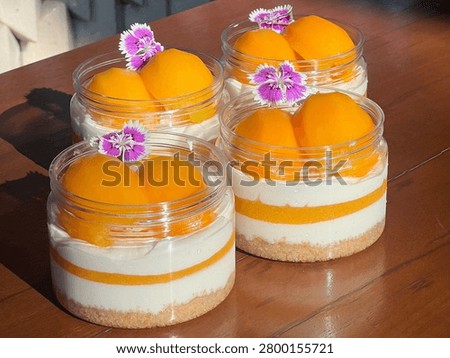 Close up plastic can of Thai Plango (Sweet yellow Marian plum) cheese pie