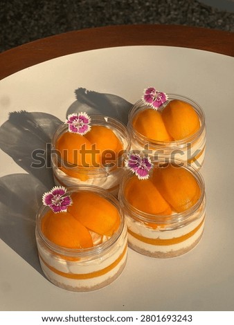 Close up plastic can of Thai Plango (Sweet yellow Marian plum) cheese pie