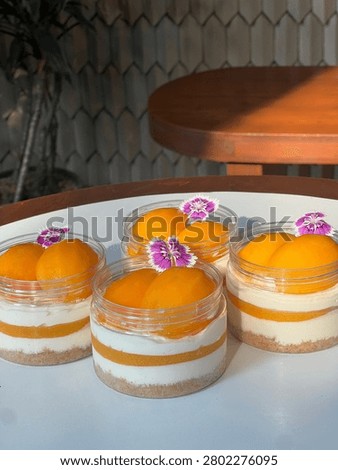Close up plastic can of Thai Plango (Sweet yellow Marian plum) cheese pie