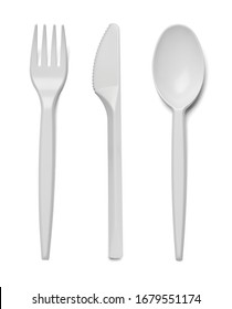 Close Up Of Plastic Cutlery Spoon, Fork, Knife On White Background