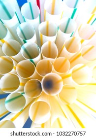 Close up plastic straw macro in the cup 