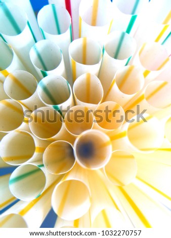 Close up plastic straw macro in the cup 