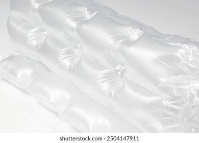 Close up plastic translucent air packaging, Plastic translucent packaging with air cushion. Inflatable air bag isolated on white background.