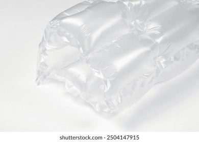 Close up plastic translucent air packaging, Plastic translucent packaging with air cushion. Inflatable air bag isolated on white background.