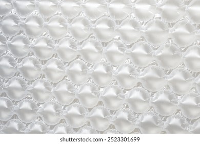 Close up plastic translucent air packaging, Plastic translucent packaging with air cushion. Inflatable air bag isolated on white background.