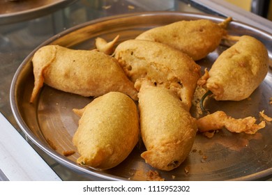 Close Up Of A Plate With Pyaaz Kachori, A Deep Fried Snack.