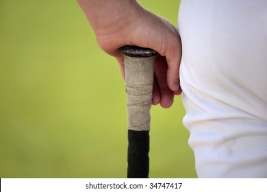 Close Up Of Player Holding Baseball Bat