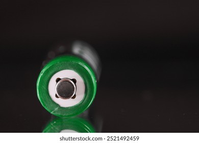 Close up of plus contact of an AA or AAA battery