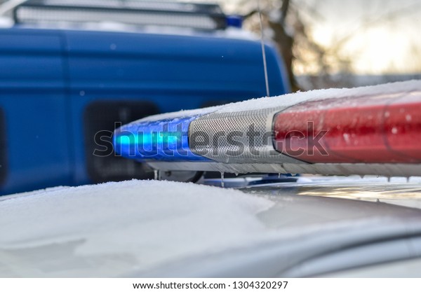 Close up of\
police car light flasher in\
winter.