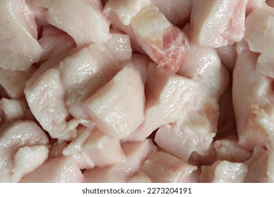 Close up of pork fat.Blood lipids are fatty substances carried in the bloodstream. High levels of LDL cholesterol and triglycerides increase the risk of heart disease.