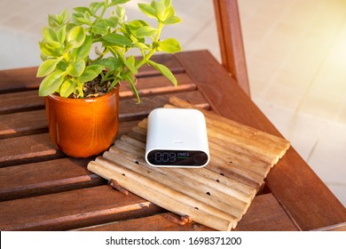 Close Up Portable Air Quality Monitor Detect PM 2.5, The Low Level Is Good Air Quality.