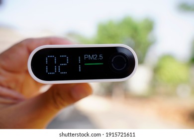 Close Up Of Portable Air Quality Monitor Detect PM 2.5 With Low Level Is Good Air Quality.