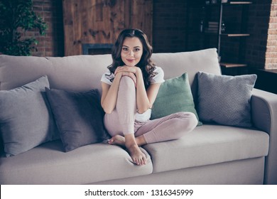 Close Up Portrait Amazing Wonderful Pretty Brunette She Her Lady Legs Couch Arms Chin Comfortable Leaning Pillows Wearing Home Domestic White Grey Sweatpants T-shirt Outfit Sit Comfy Divan