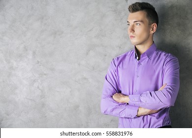 Close Up Portrait Of Attractive European Male In Bright Purple Shirt