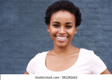 Close Up Portrait Of Attractive Young Black Woman Smiling
