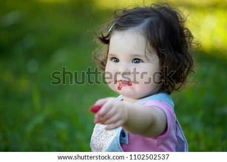 Similar – Six months old baby girl outdoors