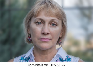 Close Up Portrait Of Beautiful Blonde 55 Years Old.