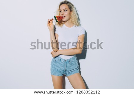 Similar – Image, Stock Photo Young and blonde woman holding a strawberry ice cream