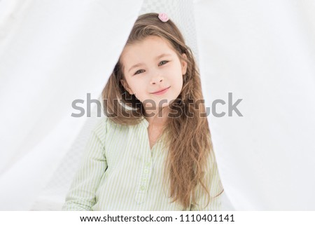 Similar – Image, Stock Photo cute kid girl relaxing at home in cozy weekend morning