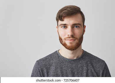 Close Up Portrait Of Beautiful Manly Bearded Guy With Stylish Hairstyle Smiling, Looking In Camera With Happy And Calm Face Expression.