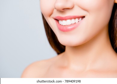 Close Up Portrait Of Beautiful Wide Smile With Whitening Teeth Of Young Fresh Woman Isolated Over White Background, Dental Care