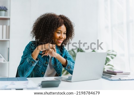 Close up portrait beautiful woman smiling and using laptop computer.
