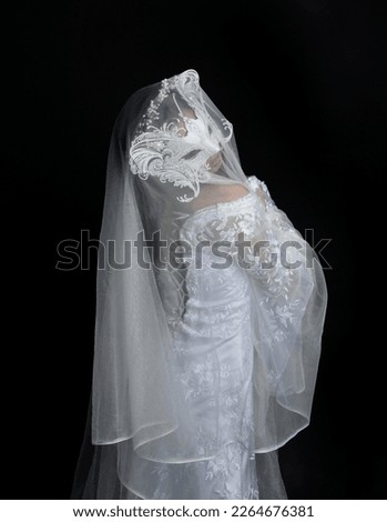 sad bride in wedding dress and long veil