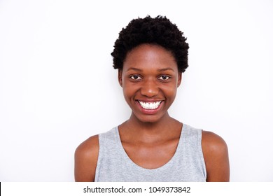 Close Up Portrait Of Beautiful Young African Woman With Big Smile On White Background