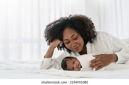 Close Up Portrait Of Beautiful Young African American Mother Holding Sleep Newborn Baby In Hospital. Healthcare Medical Love Black Afro Woman Lifestyle Mother's Day, Breast Concept With Copy Space. 