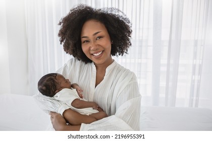 Close Up Portrait Of Beautiful Young African American  Mother Holding Sleep Newborn Baby In Hospital. Healthcare Medical Love Black Afro Woman Lifestyle Mother's Day, Breast Concept With Copy Space. 