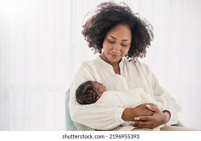 Close Up Portrait Of Beautiful Young African American  Mother Holding Sleep Newborn Baby In Hospital. Healthcare Medical Love Black Afro Woman Lifestyle Mother's Day, Breast Concept With Copy Space. 