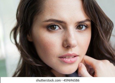 Close Up Portrait Of Beautiful Young Woman's Face