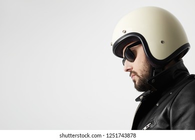 Close Up Portrait Of Biker Man, Wearing A White Helmet And Sunglasses, Side View. Space For Your Text.