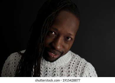 A Close Up Portrait Of A Black Male Crying.