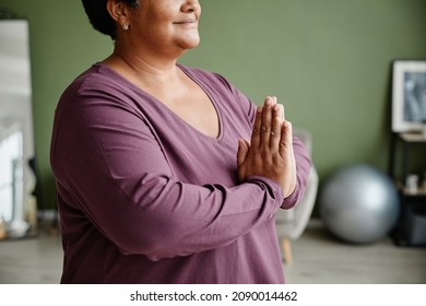 Close Up Portrait Of Black Senior Woman Meditating At Home And Smiling, Copy Space