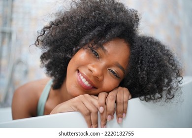 Close Up Portrait Of A Cheerful Afro Girl Smile With Happiness In The Morning.