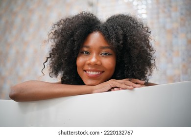 Close Up Portrait Of A Cheerful Afro Girl Smile With Happiness In The Morning.