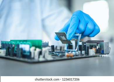 Close up portrait of computer engineer's hand is holding CPU's computer. - Powered by Shutterstock