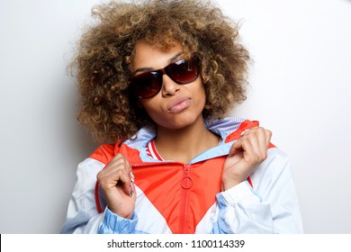 Close up portrait of cool young black woman with sunglasses - Powered by Shutterstock