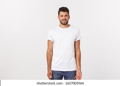 Close up portrait of disappointed stressed bearded young man in shirt over white background. - Shutterstock ID 1657005964