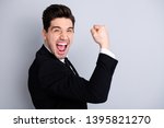 Close up portrait emotional millennial chairmen executive feel thrilled scream shout yeah raise fists expression impressed celebration contract modern classic outfit isolated grey background