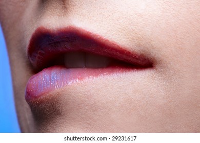 close up portrait of european girl biting her lips