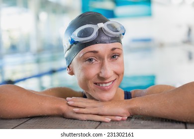 Close up portrait of a fit female swimmer in the pool at leisure center - Powered by Shutterstock