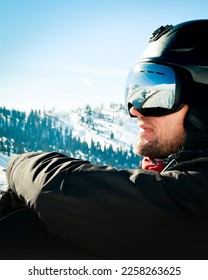 Close up portrait guy holding snowboard in winter, sports wear, helmet, sunglasses, winter, up, freedom, nature, attractive, clothes, sport, competitions, winter holidays, alps.